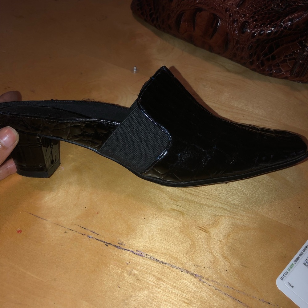 Croc print mules.